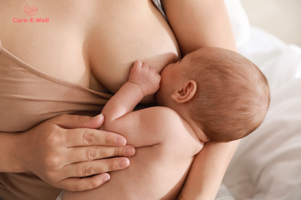 Parent trying a comfortable breastfeeding position with a newborn baby
